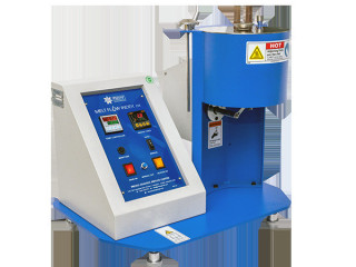 What is a Melt Flow Index Tester, and how does it measure the flow characteristics of polymers?