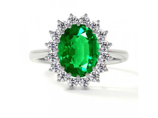 Get 3.04 cttw GIA Certified Classic Princess Diana Replica Oval Emerald Halo Ring.