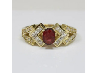 Get Oval Ruby Ring with Beautiful Diamonds